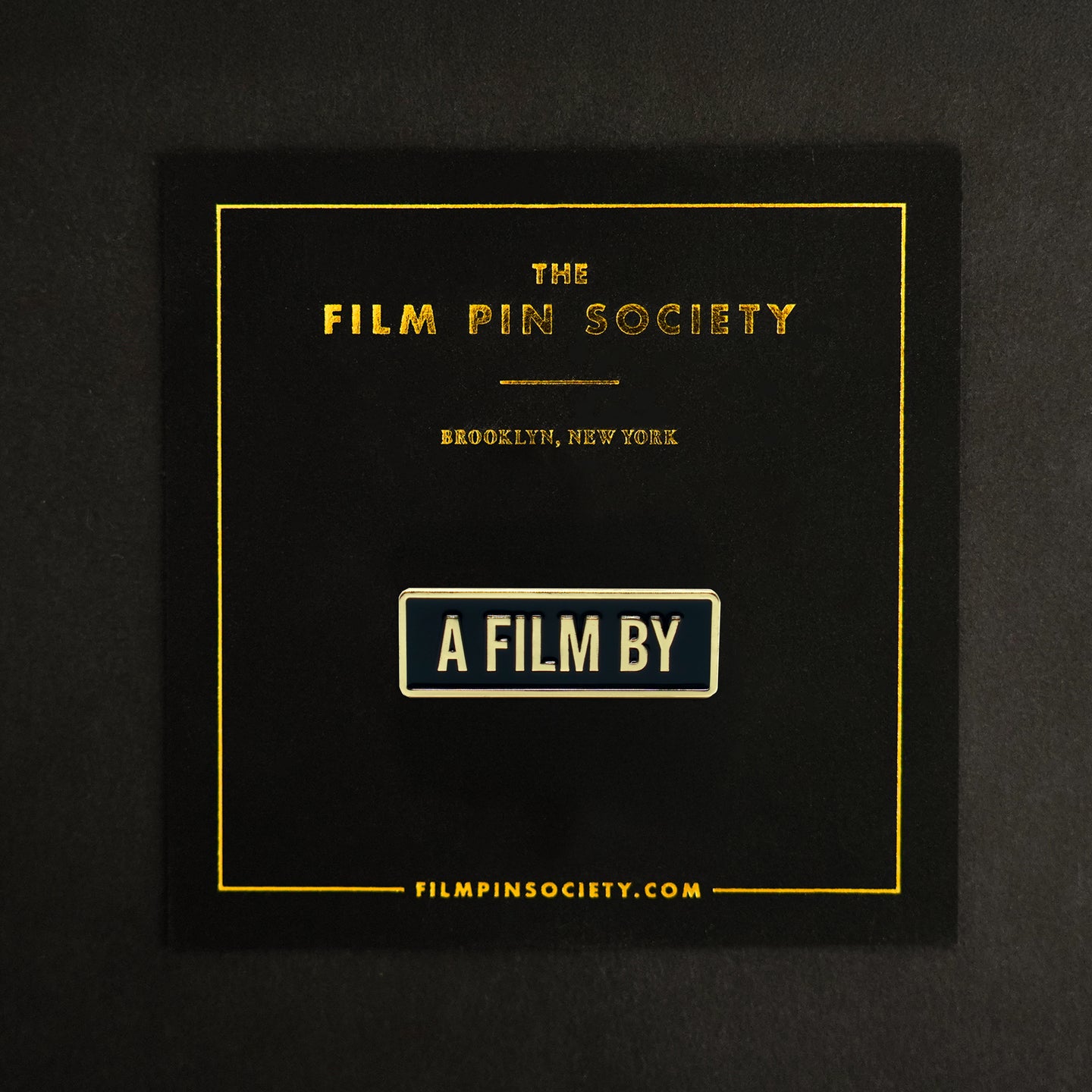 A Film by Credit Enamel Pin