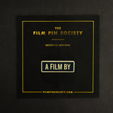 A Film by Credit Enamel Pin