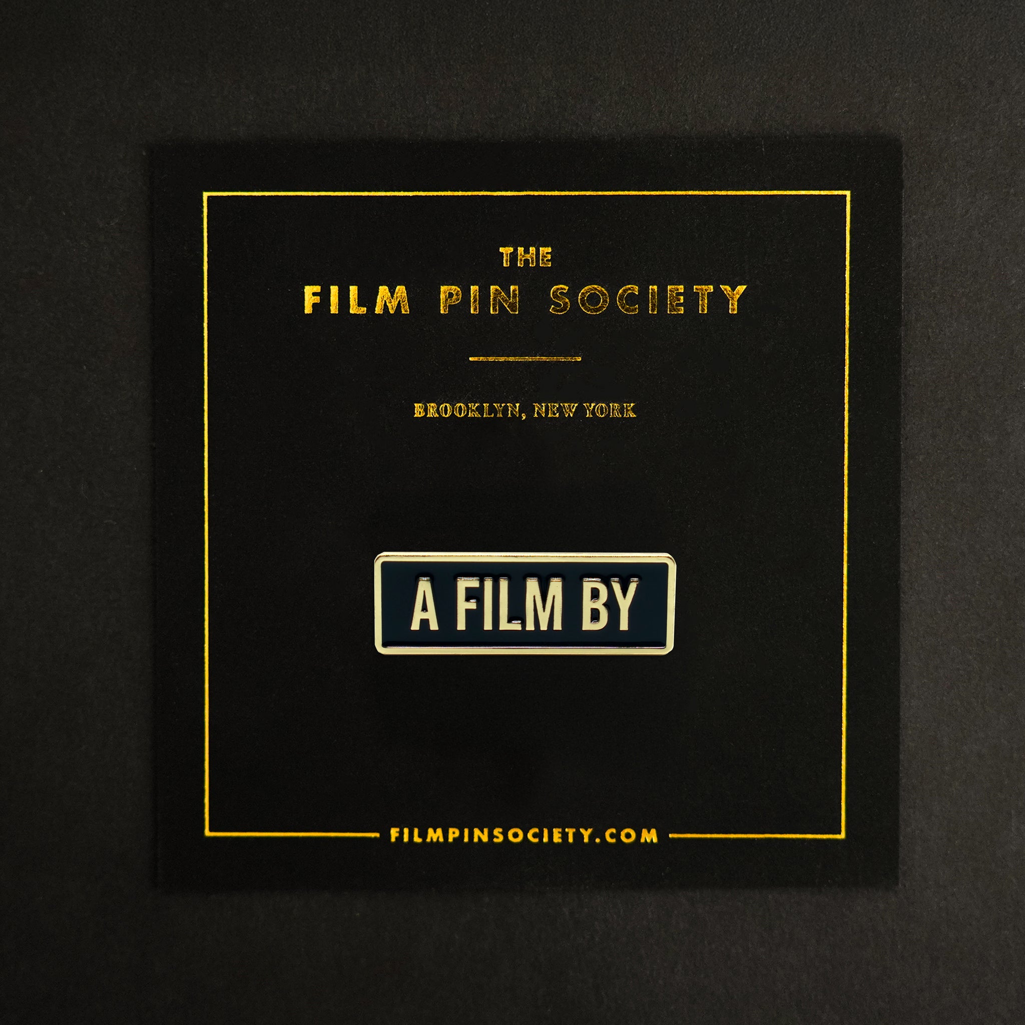 A Film by Credit Enamel Pin