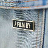 A Film by Credit Enamel Pin