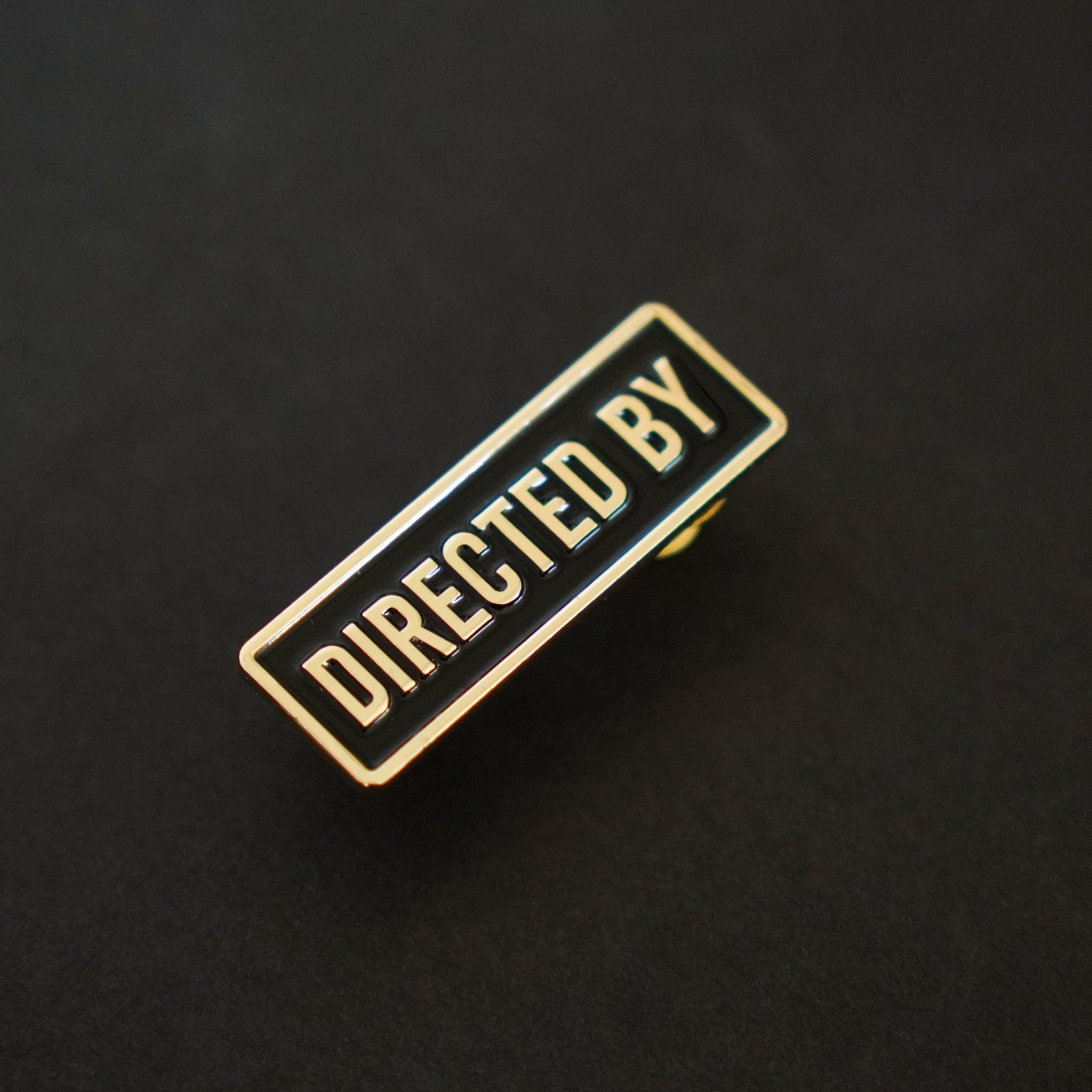 Directed by Credit Enamel Pin