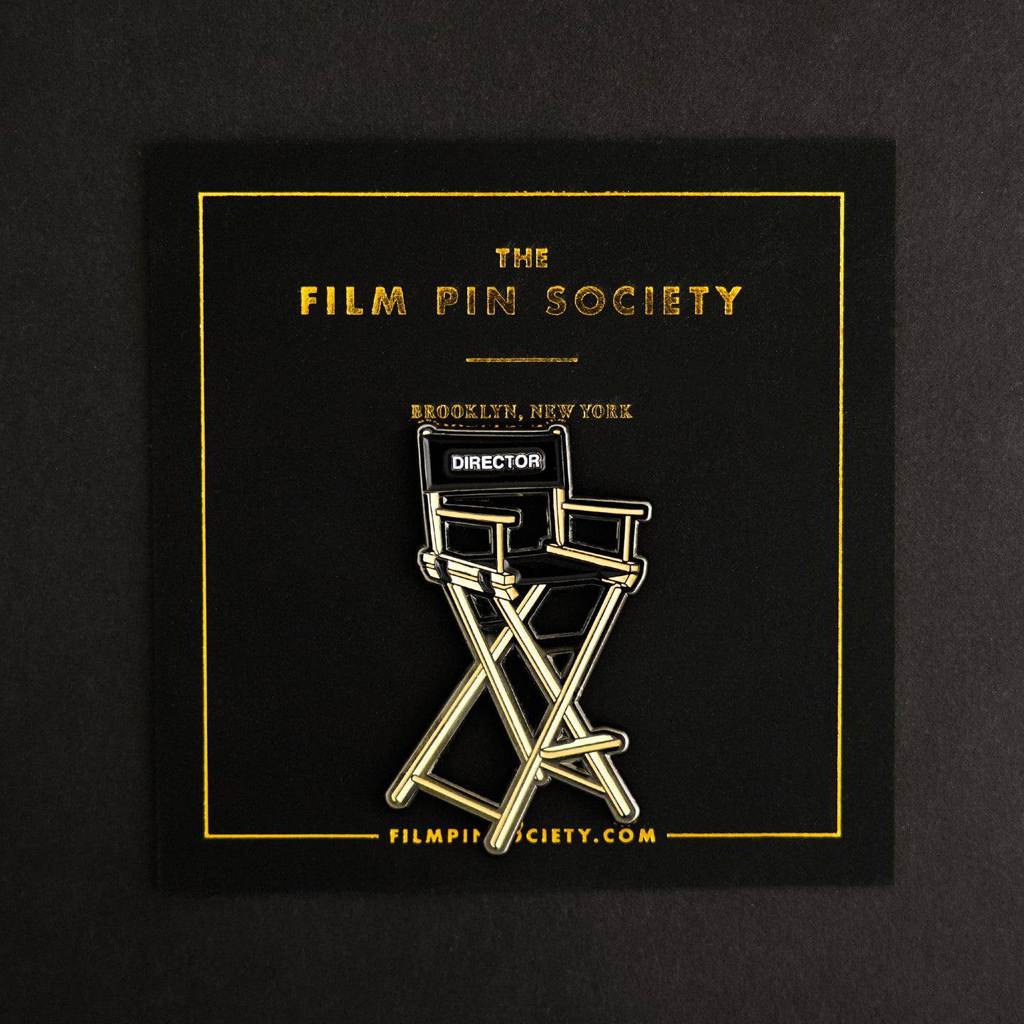 Director's Chair Enamel Pin