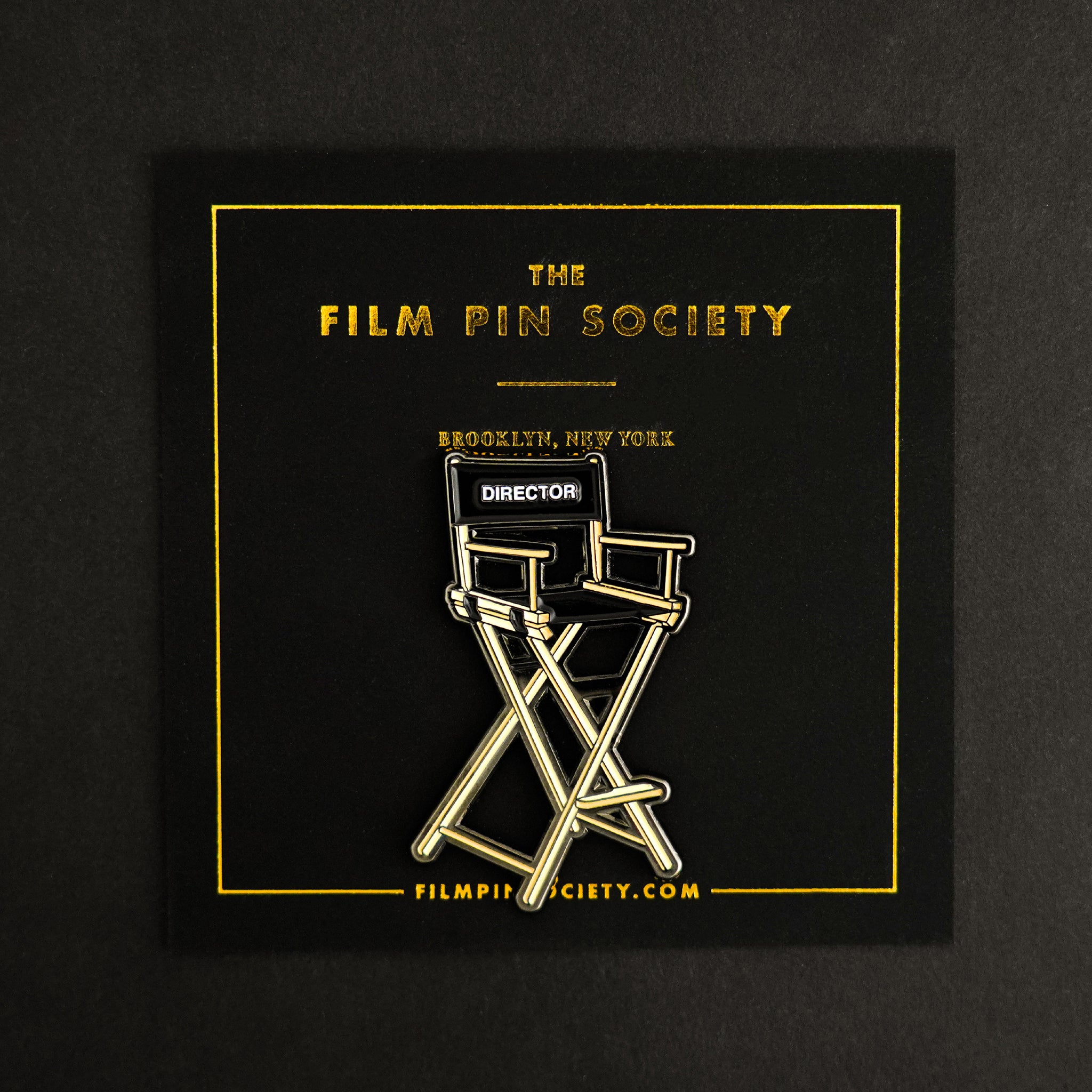 Director's Chair Enamel Pin