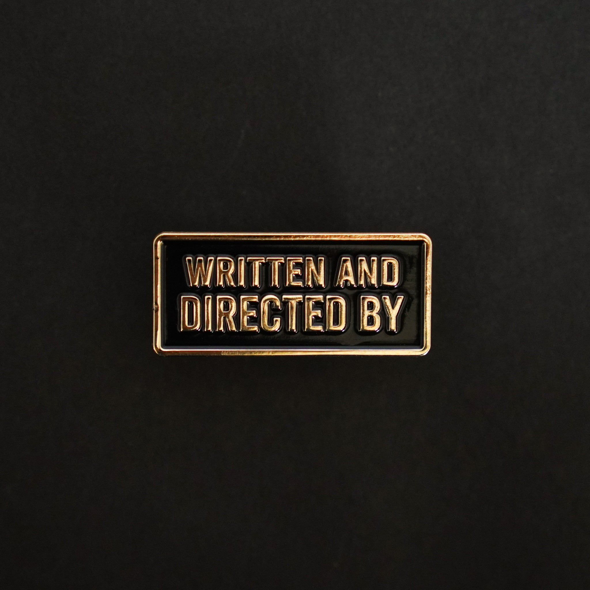 Written and Directed by Credit Enamel Pin