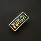 Written and Directed by Credit Enamel Pin